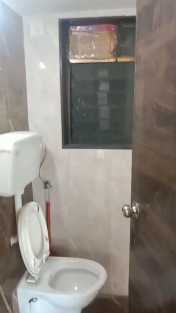 Bathroom in 2 BHK Apartment at Navkar Tower Part 1, Naigaon East – for Rent