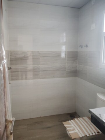 Bathroom in 2 BHK Apartment at Wave Floors Premium, Wave City – for Sale