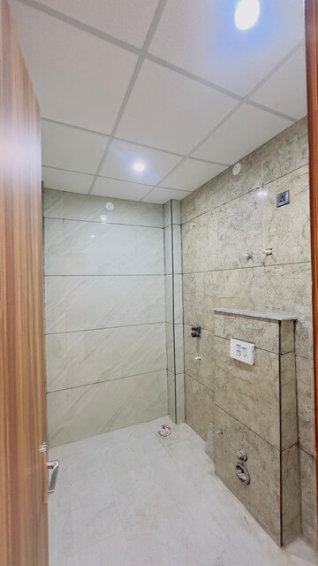 Bathroom in 3 BHK Builder Floor at Sahastradhara Road – for Sale