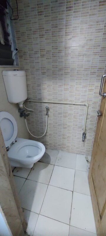Bathroom in 1 BHK Apartment at Omkar Vayu, Mahim – for Rent