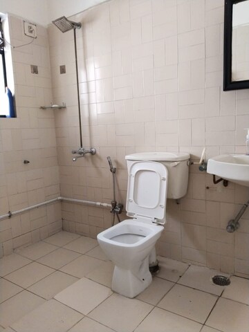 Bathroom in 2 BHK Apartment at Moghul Garden, Koregaon – for Rent