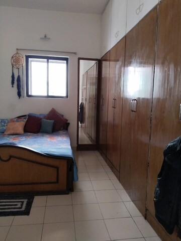 Bedroom in 2 BHK Apartment at Moghul Garden, Koregaon – for Rent
