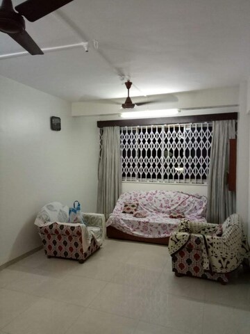 Living Room in 1 BHK Apartment at Vishrant Society, Vishrantwadi – for Rent