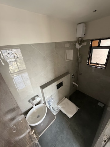 Bathroom in 1 BHK Apartment at UK Iridium, Kandivali East – for Rent