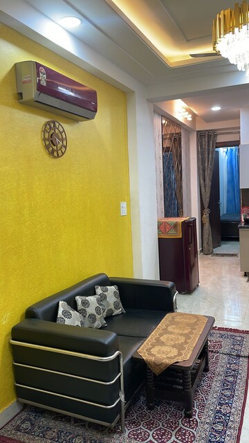 Living Room in 2 BHK Apartment at Soho Apartments, Shakti Khand – for Rent