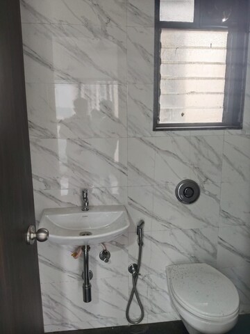 Bathroom in 1 BHK Apartment at UK Iridium, Kandivali East – for Rent