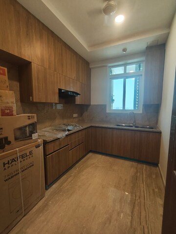Kitchen in 4 BHK Apartment at Ambience Creacions, Sector 22 – for Rent