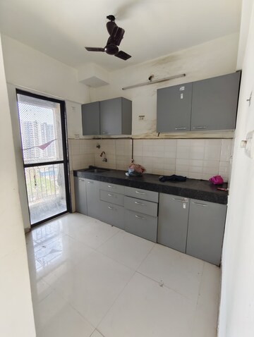 Kitchen in 1.5 BHK Apartment at Man Opus, Mira Road – for Sale
