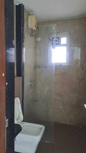 Bathroom in 3 BHK Apartment at Kalpataru Siddhachal Elite, Vasant Vihar – for Rent