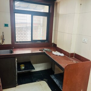 Kitchen in 1 RK Apartment at Sunflower Apartment Ghatkopar, Rajawadi – for Sale
