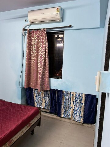Bedroom in 2 BHK Apartment at Crystal Tower, Parel – for Rent