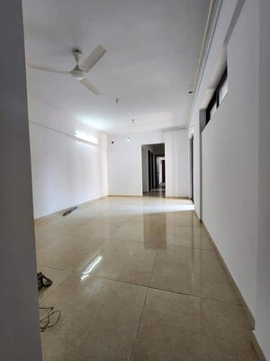 Living Room in 2 BHK Apartment at Lodha Palava City Lakeshore Greens, Dombivli East – for Sale