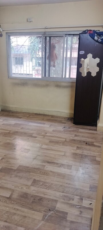 Room in 1 BHK Apartment at Manish Kaveri CHS, Andheri West – for Rent