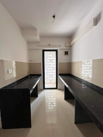 Kitchen in 2 BHK Apartment at Lodha Palava Downtown, Dombivli East – for Sale
