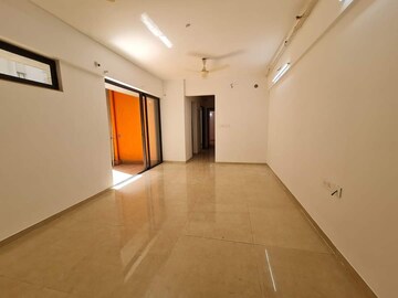 Living Room in 2 BHK Apartment at Lodha Palava City Lakeshore Greens, Dombivli East – for Sale