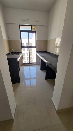 Kitchen in 1 BHK Apartment at Lodha Palava Downtown, Dombivli East – for Sale