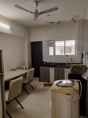 Kitchen in 2 BHK Builder Floor at Rahu Nisarg Society, Warje – for Sale