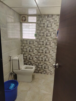 Bathroom in 2 BHK Builder Floor at Rahu Nisarg Society, Warje – for Sale