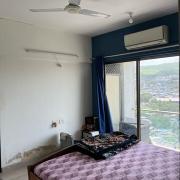 Living Room in 1 BHK Apartment at Conwood Astoria, Umershetpada – for Rent