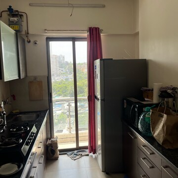 Kitchen in 1 BHK Apartment at Conwood Astoria, Umershetpada – for Rent