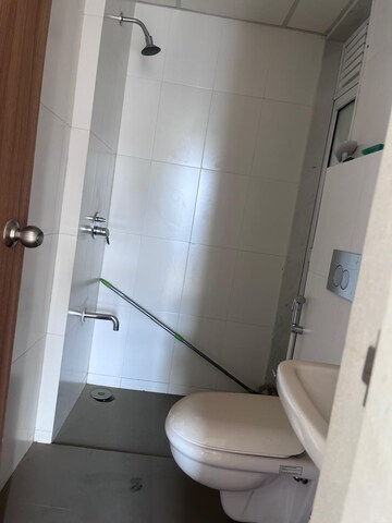 Bathroom in 2 BHK Apartment at Piramal Vaikunth, Balkum Pada – for Rent