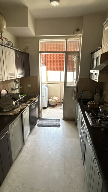 Kitchen in 3 BHK Apartment at Godrej Woods, Sector 43 – for Sale