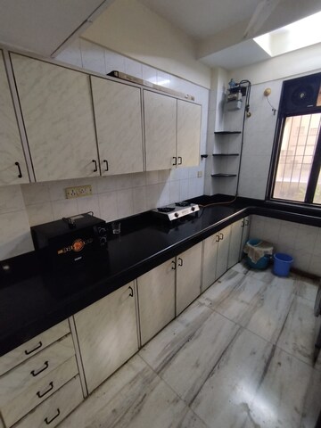 Kitchen in 2 BHK Apartment at Goregaon West View CHS, Goregaon West – for Rent