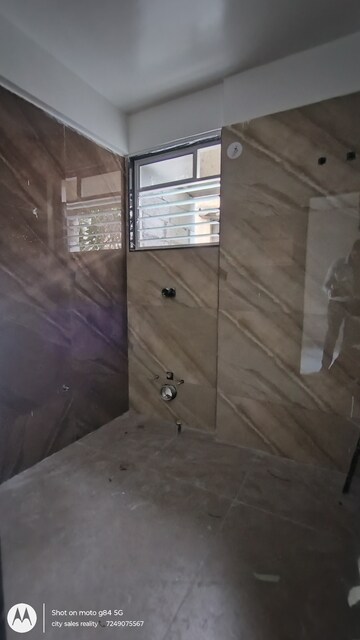 Bathroom in 2 BHK Apartment at Bhujbal Bhagirathi Tower II, Kothrud – for Sale