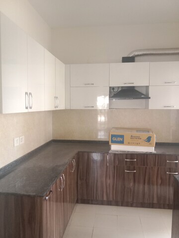 Kitchen in 3 BHK Apartment at Ramprastha City The Atrium, Sector 37d – for Rent