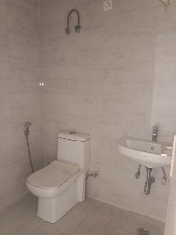 Bathroom in 3 BHK Apartment at Ramprastha City The Atrium, Sector 37d – for Rent