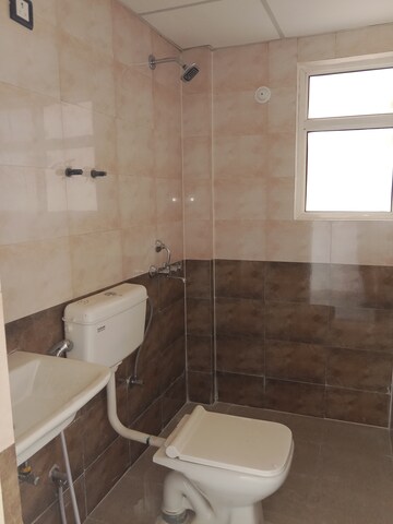 Bathroom in 3 BHK Apartment at Ramprastha City The Atrium, Sector 37d – for Rent