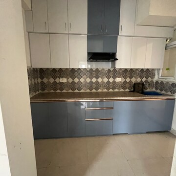 Kitchen in 2 BHK Apartment at Signature Orchard Avenue 2, Hayatpur – for Rent