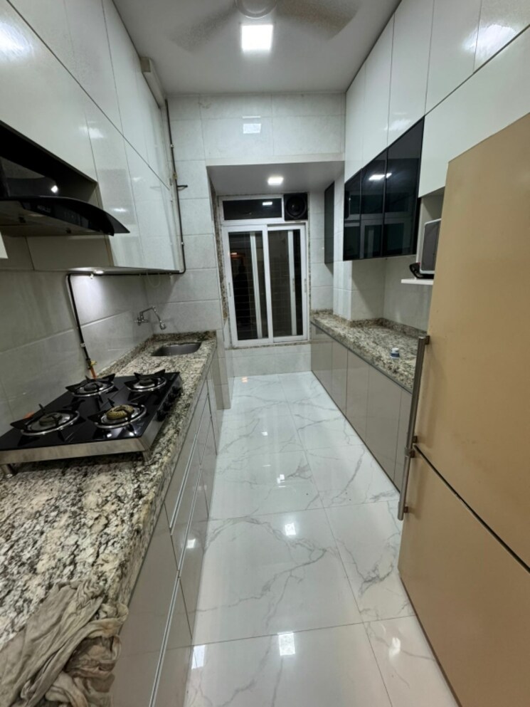 Kitchen, nirmal-lifestyle-residency-chs-ltd 3 Bedroom 900 Sq.Ft. Apartment In Mulund West Mumbai 8800471