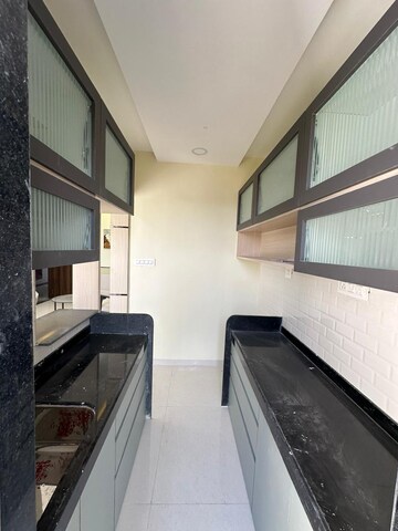 Kitchen in 1 BHK Apartment at Empire Centrum, Ambernath West – for Sale