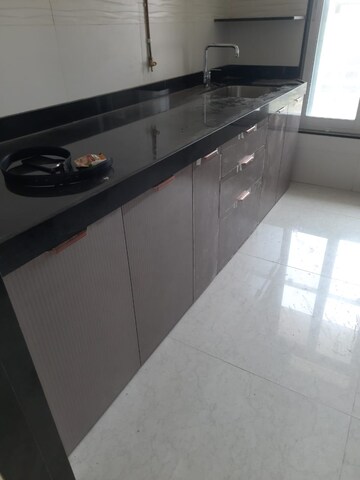 Kitchen in 2 BHK Apartment at Triumph Tower, Malad West – for Rent