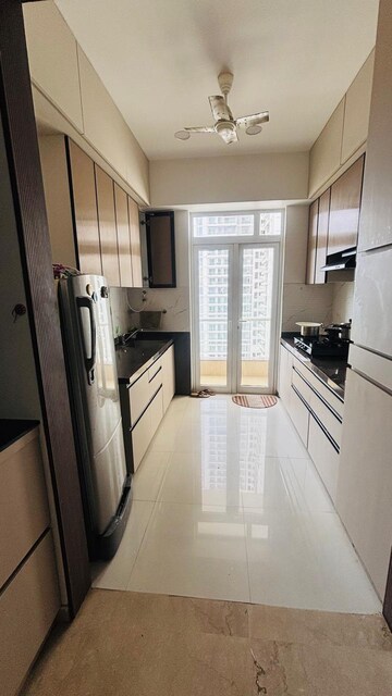 Kitchen in 2 BHK Apartment at Omkar Alta Monte, Malad East – for Rent
