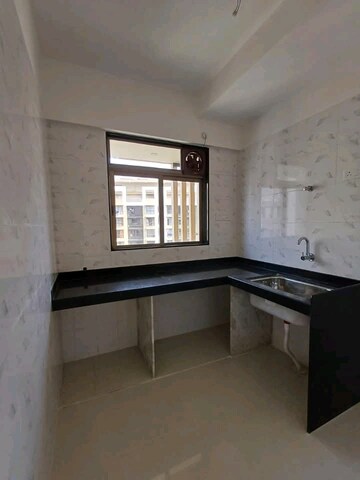 Kitchen in 1 BHK Apartment at Chandak Nishchay, Borivali East – for Sale