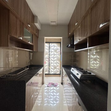 Kitchen in 2.5 BHK Apartment at Lodha Downtown, Taloja Bypass Road – for Rent