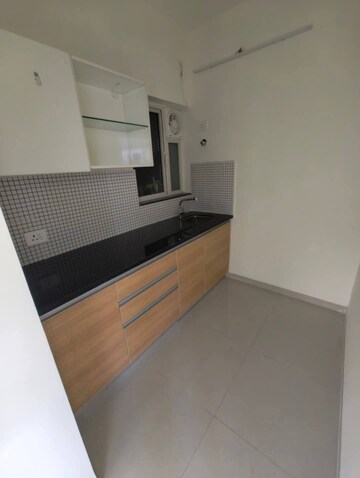 Kitchen in 2 BHK Apartment at Omkar Signet, Malad East – for Rent