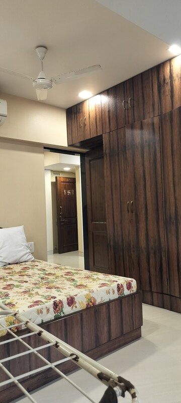 Living Room in 1 BHK Apartment at Mudheshwari CHS, Khar West – for Rent