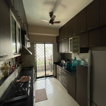 Kitchen in 2 BHK Apartment at Swapnalok Towers, Riddhi Gardens – for Rent