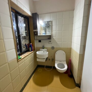 Bathroom in 2 BHK Apartment at Swapnalok Towers, Riddhi Gardens – for Rent