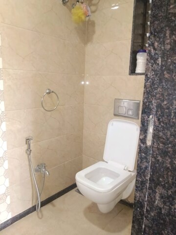 Bathroom in 1 BHK Apartment at Lokhandwala Whispering Palms, Kandivali East – for Rent