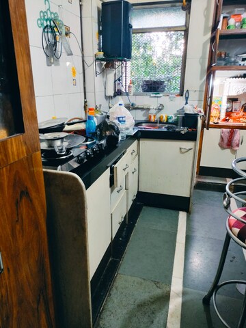 Kitchen in 2 BHK Apartment at Rutu Enclave, Kasarvadavali – for Rent