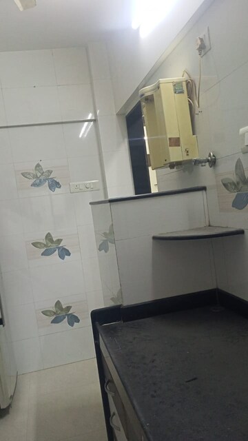 Kitchen in 1 BHK Apartment at Panchavati Gardens, Malad East – for Rent