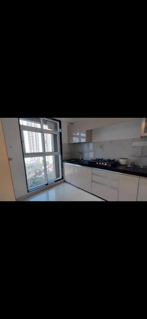 Kitchen in 2 BHK Apartment at MICL Aaradhya Parkwood, Mira Road – for Sale
