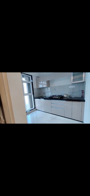 Kitchen in 2 BHK Apartment at MICL Aaradhya Parkwood, Mira Road – for Sale