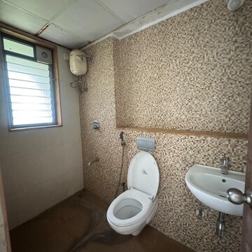 Bathroom in 1 BHK Apartment at Lodha Palava Downtown, Taloja Bypass Road – for Rent