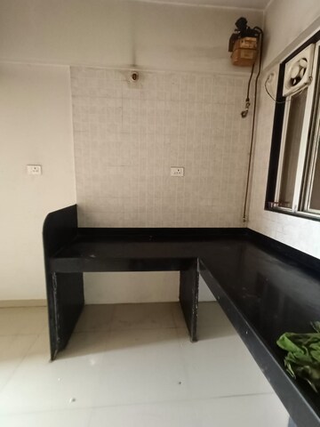 Kitchen in 1 BHK Apartment at Sonigara Laurel, Wakad – for Rent