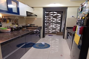 Kitchen in 1.5 BHK Apartment at Lodha Lakeshore Greens, Dombivli East – for Sale